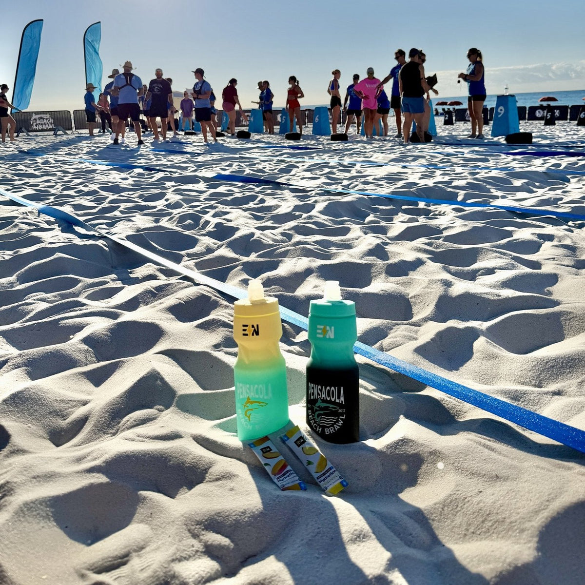 Beach Brawl bottles on the sand at Pensacola Beach